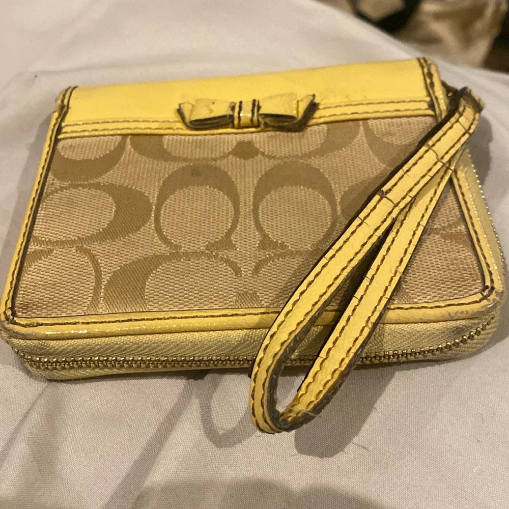 Coach zippable wallet with wristlet strap